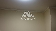 Установить в коридоре два потолочных светильника