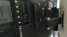 Подвесить телевизор