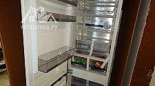 Перенавесить двери холодильника