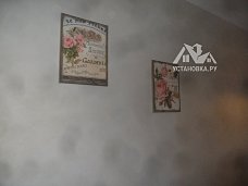 Работа по навешиванию картин