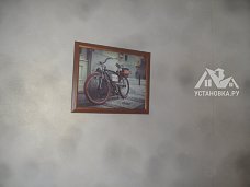 Работа по навешиванию картин