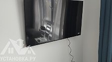 Подвесить и настроить телевизор