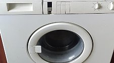 Установить новую отдельно стоящую стиральную машину