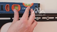 Повесить телевизор