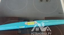Установить встраиваемую вытяжку и электрическую плиту