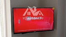 Повесить телевизор
