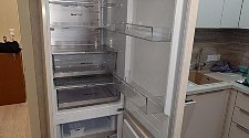 Перенавесить двери холодильника
