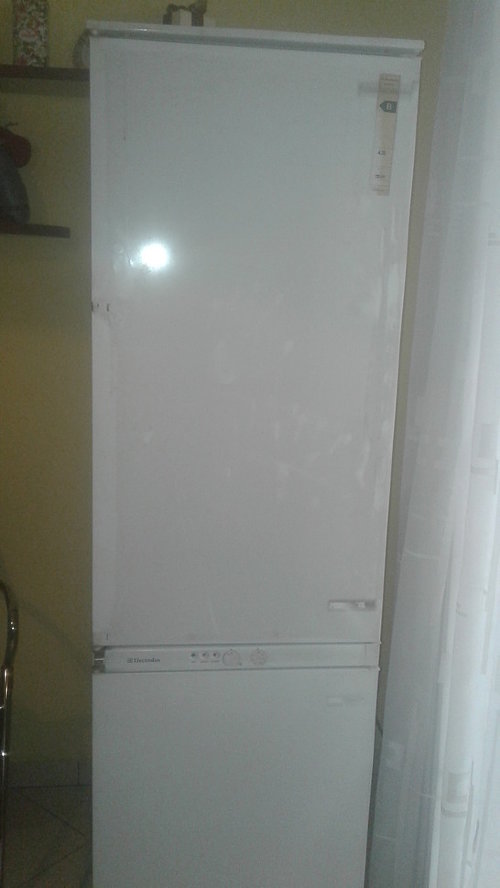 Демонтировать встраиваемый холодильник Electrolux