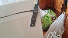 Перенавесить двери холодильника