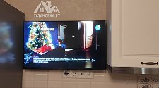 Подвесить и настроить телевизор