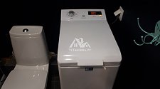 Установить отдельностоящую стиральную машину Electrolux EWT1066ESW в ванной комнате