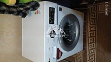 Установить на готовые коммуникации в ванной комнате новую стиральную машину LG