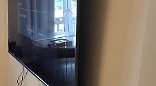 Подвесить и настроить телевизор