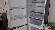 Перенавесить двери холодильника