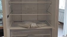 Установить холодильник и перенавесить на нём двери