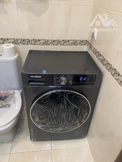 Установить новую отдельно стоящую стиральную машину 