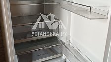 Перенавесить двери холодильника