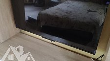 Повесить телевизор