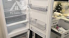 Перенавесить двери холодильника
