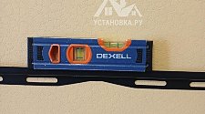 Подвесить и настроить телевизор