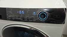 Установить стиральную машину и сушильную в колонну.