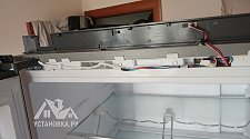 Перенавесить двери холодильника