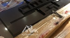 Подвесить и настроить большой  телевизор