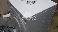 Установить отдельно стоящую на кухне новую стиральную машину Hotpoint Ariston