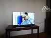 Установить/подвесить и настроить телевизор

