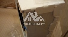 Установить на подготовленное место новую стиральную машину Hotpoint-Ariston VMSL 5081 B