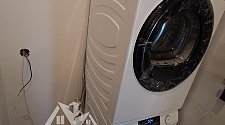 Установить стиральную машину и сушильную машину в колонну