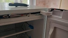 Перенавесить двери холодильника
