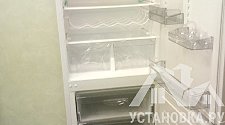 Установить холодильник и перевесить на нём двери в офисе