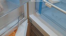 Перенавесить двери холодильника
