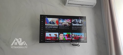 Повесить телевизор