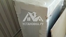 Установить на подготовленное место новую стиральную машину Hotpoint-Ariston VMSL 5081 B