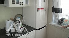 Провести работы по установке отдеьностоящего холодильника