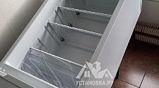 Установить холодильник отдельностоящий и перенавесить на нём двери
