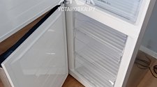 Перенавесить двери холодильника
