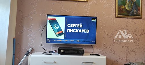 Повесить телевизор