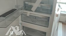 Перенавесить двери холодильника