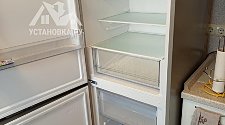 Перенавесить двери холодильника