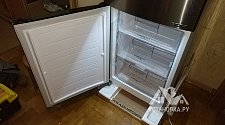 Работа по перевешиванию дверей на холодильнике