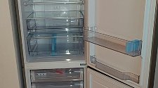 Перенавесить двери холодильника