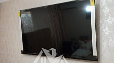 Повесить телевизор