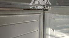 Перенавесить двери холодильника
