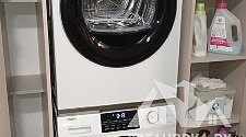 Установить стиральную и сушильную машины в колонну