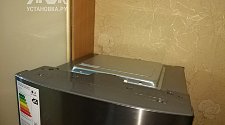 Работа по перевешиванию дверей на холодильнике