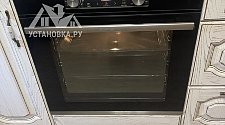 Установить встраиваемый электрический духовой шкаф и варочную панель