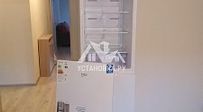 Установить отдельно стоящую в ванной комнате новую стиральную машину Beko